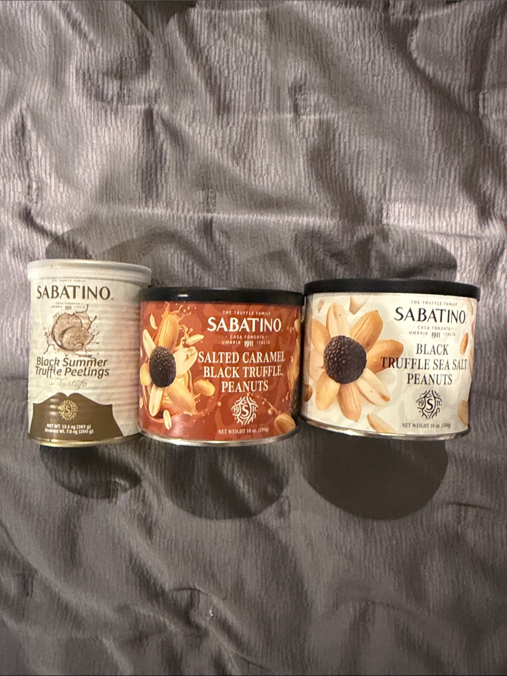 Lots of Sabatino Black Truffle Peelings 2 cans peanuts